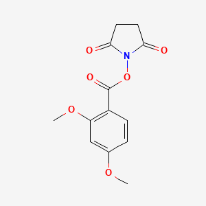molecular formula C13H13NO6 B1450257 2,5-二氧代吡咯烷-1-基 2,4-二甲氧基苯甲酸酯 CAS No. 1638612-98-2