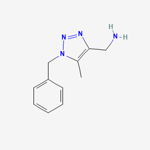 molecular formula C11H14N4 B1450448 (1-benzyl-5-methyl-1H-1,2,3-triazol-4-yl)methanamine CAS No. 1267318-09-1