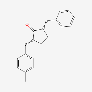 molecular formula C20H18O B14518685 2-Benzylidene-5-[(4-methylphenyl)methylidene]cyclopentan-1-one CAS No. 62643-65-6