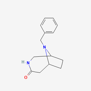 molecular formula C14H18N2O B1452108 9-苄基-3,9-二氮杂双环[4.2.1]壬烷-4-酮 CAS No. 897396-10-0