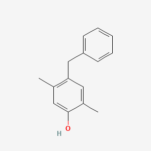 molecular formula C15H16O B14522600 Phenol, 2,5-dimethyl-4-(phenylmethyl)- CAS No. 62577-75-7