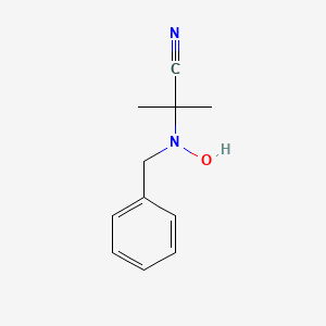 2-[Benzyl(hydroxy)amino]-2-methylpropanenitrile