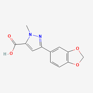 molecular formula C12H10N2O4 B1452873 3-(1,3-ベンゾジオキソール-5-イル)-1-メチル-1H-ピラゾール-5-カルボン酸 CAS No. 1177271-75-8