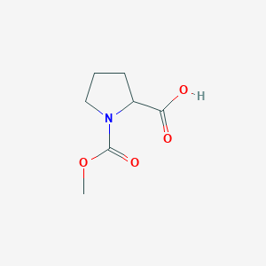 molecular formula C7H11NO4 B145321 1-(甲氧羰基)吡咯烷-2-羧酸 CAS No. 134250-76-3