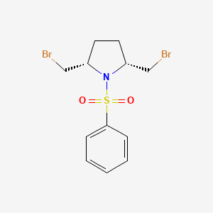 (2R,5S)-1-(Benzenesulfonyl)-2,5-bis(bromomethyl)pyrrolidine