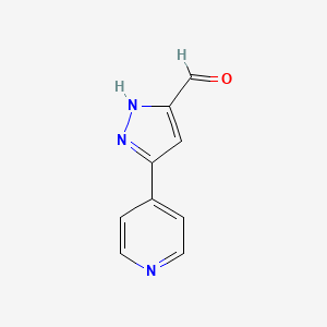 molecular formula C9H7N3O B1453944 1H-吡唑-3-甲醛，5-(4-吡啶基)- CAS No. 865610-72-6