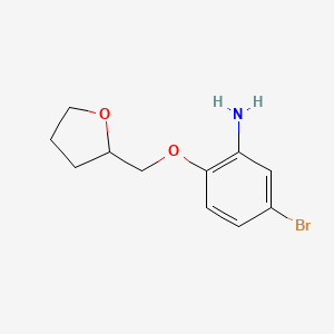 molecular formula C11H14BrNO2 B1454023 5-Bromo-2-(tetrahydro-2-furanylmethoxy)aniline CAS No. 946664-90-0