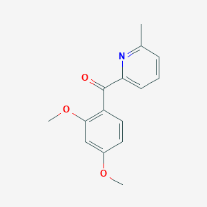 molecular formula C15H15NO3 B1454131 2-(2,4-Dimethoxybenzoyl)-6-methylpyridine CAS No. 1187163-23-0