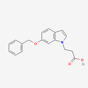 molecular formula C18H17NO3 B1454201 3-[6-(苄氧基)-1H-吲哚-1-基]丙酸 CAS No. 1219551-00-4