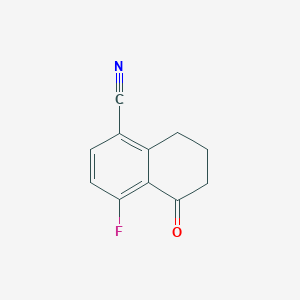 molecular formula C11H8FNO B1454946 4-Fluoro-5-oxo-5,6,7,8-tetrahydronaphthalene-1-carbonitrile CAS No. 1260013-61-3