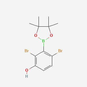 molecular formula C12H15BBr2O3 B1454956 2,4-Dibromo-3-(4,4,5,5-tetramethyl-1,3,2-dioxaborolan-2-yl)phenol CAS No. 1256781-61-9
