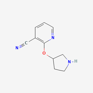 molecular formula C10H11N3O B1455253 2-(Pyrrolidin-3-yloxy)-nicotinonitrile CAS No. 1086392-84-8