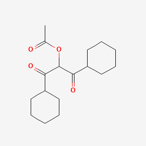 1,3-Dicyclohexyl-1,3-dioxopropan-2-yl acetate