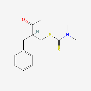 2-Benzyl-3-oxobutyl dimethylcarbamodithioate