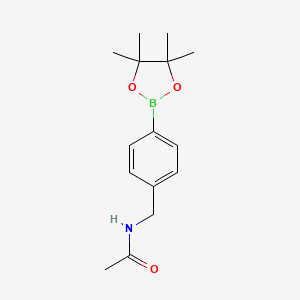 molecular formula C15H22BNO3 B1456454 N-{[4-(tetramethyl-1,3,2-dioxaborolan-2-yl)phenyl]methyl}acetamide CAS No. 1235450-93-7