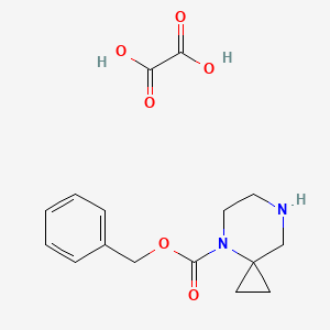 B1456515 4,7-Diaza-spiro[2.5]octane-4-carboxylic acid benzyl ester oxalate CAS No. 1187930-05-7