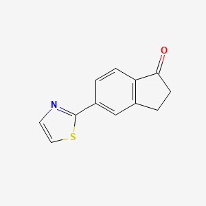 molecular formula C12H9NOS B1457104 5-Thiazol-2-yl-indan-1-one CAS No. 1334784-78-9