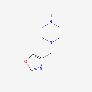 molecular formula C8H13N3O B1457583 4-(Piperazin-1-ylmethyl)oxazole CAS No. 1529441-00-6