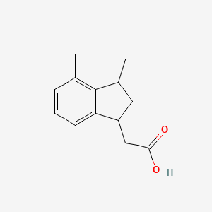 molecular formula C13H16O2 B1457637 2-(3,4-dimethyl-2,3-dihydro-1H-inden-1-yl)acetic acid CAS No. 1556266-20-6
