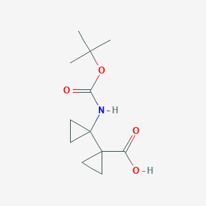 molecular formula C12H19NO4 B1457651 1'-[(tert-Butoxycarbonyl)amino]-1,1'-bi(cyclopropyl)-1-carboxylic acid CAS No. 1784118-69-9