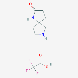 B1458559 1,7-Diazaspiro[4.4]nonan-2-one 2,2,2-trifluoroacetate CAS No. 1566649-47-5