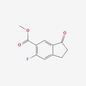 Methyl 6-fluoro-3-oxo-2,3-dihydro-1H-indene-5-carboxylate