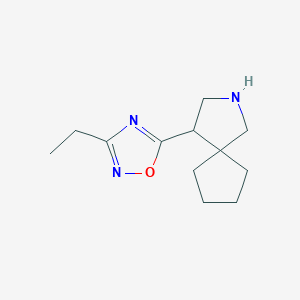 B1458719 3-Ethyl-5-(2-azaspiro[4.4]nonan-4-yl)-1,2,4-oxadiazole CAS No. 1955515-78-2
