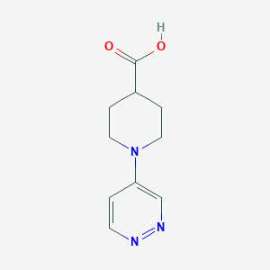 molecular formula C10H13N3O2 B1459136 1-吡啶嗪-4-基哌啶-4-羧酸 CAS No. 1428233-17-3