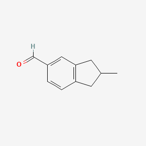 2-Methyl-2,3-dihydro-1H-indene-5-carbaldehyde