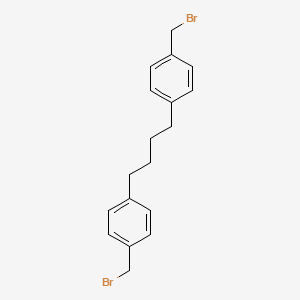 molecular formula C18H20Br2 B14594551 1,1'-(Butane-1,4-diyl)bis[4-(bromomethyl)benzene] CAS No. 61390-67-8