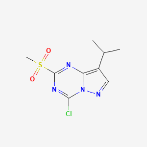 molecular formula C9H11ClN4O2S B1459569 4-氯-8-异丙基-2-(甲磺酰基)吡唑并[1,5-a][1,3,5]三嗪 CAS No. 1453836-38-8