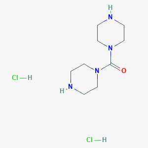 molecular formula C9H20Cl2N4O B1459685 二(1-哌嗪基)甲甲酮二盐酸盐 CAS No. 208711-30-2