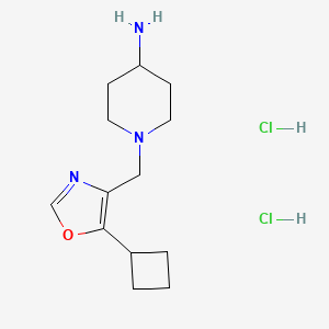molecular formula C13H23Cl2N3O B1460585 1-[(5-Cyclobutyl-1,3-oxazol-4-yl)methyl]piperidin-4-amine dihydrochloride CAS No. 2140316-43-2