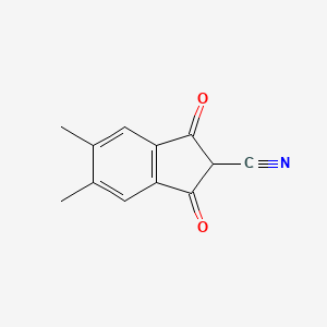 molecular formula C12H9NO2 B14616239 5,6-Dimethyl-1,3-dioxo-2,3-dihydro-1H-indene-2-carbonitrile CAS No. 58138-32-2