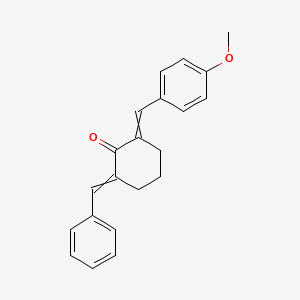 2-Benzylidene-6-[(4-methoxyphenyl)methylidene]cyclohexan-1-one