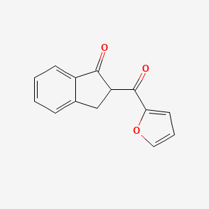 2-(Furan-2-carbonyl)-2,3-dihydroinden-1-one