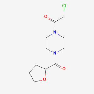 2-Chloro-1-(4-(tetrahydrofuran-2-carbonyl)piperazin-1-yl)ethan-1-one