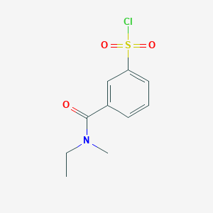 molecular formula C10H12ClNO3S B1462277 3-[Ethyl(methyl)carbamoyl]benzene-1-sulfonyl chloride CAS No. 1094841-09-4