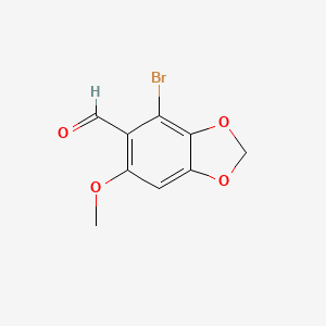 molecular formula C9H7BrO4 B14627983 4-Bromo-6-methoxy-2H-1,3-benzodioxole-5-carbaldehyde CAS No. 55950-27-1