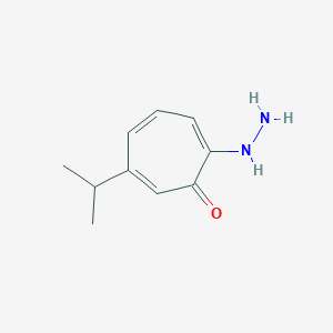 2,4,6-Cycloheptatrien-1-one, 2-hydrazino-6-(1-methylethyl)-