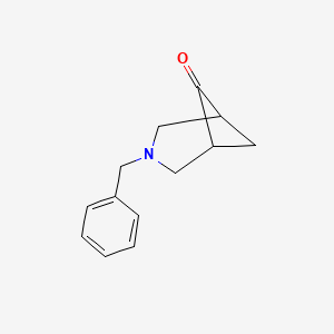molecular formula C13H15NO B1462957 3-Benzyl-3-azabicyclo[3.1.1]heptan-6-one CAS No. 1240529-14-9