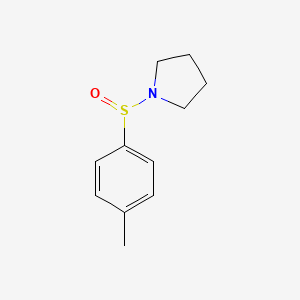 1-(4-Methylbenzene-1-sulfinyl)pyrrolidine