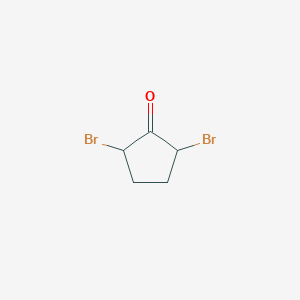 Cyclopentanone, 2,5-dibromo-