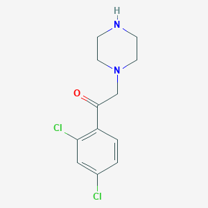 molecular formula C12H14Cl2N2O B1463831 1-(2,4-Dichlorophenyl)-2-(piperazin-1-yl)ethan-1-one CAS No. 1240580-24-8