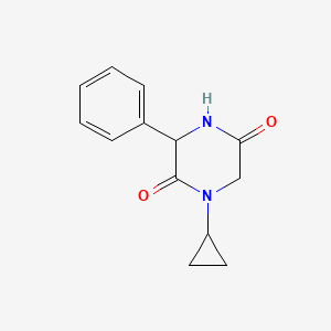 molecular formula C13H14N2O2 B1463876 1-Cyclopropyl-3-phenylpiperazine-2,5-dione CAS No. 1283107-93-6