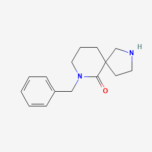 molecular formula C15H20N2O B1464179 7-Benzyl-2,7-diazaspiro[4.5]decan-6-one CAS No. 1203798-25-7