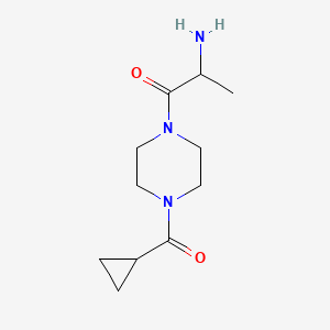 molecular formula C11H19N3O2 B1464311 2-Amino-1-(4-cyclopropanecarbonylpiperazin-1-yl)propan-1-one CAS No. 1218158-34-9