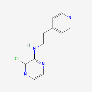 molecular formula C11H11ClN4 B1464489 3-氯-N-[2-(吡啶-4-基)乙基]吡嗪-2-胺 CAS No. 1251284-17-9