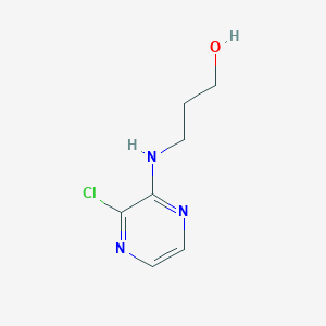 molecular formula C7H10ClN3O B1464513 3-[(3-Chloropyrazin-2-yl)amino]propan-1-ol CAS No. 1248080-58-1