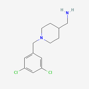 molecular formula C13H18Cl2N2 B1464674 {1-[(3,5-Dichlorophenyl)methyl]piperidin-4-yl}methanamine CAS No. 1283585-13-6